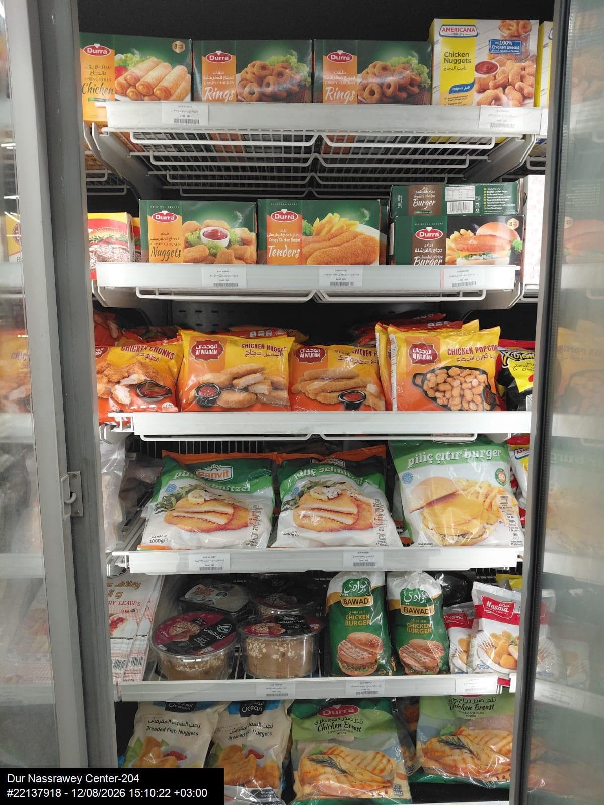 Multiple competing brands visible together on a retail freezer shelf