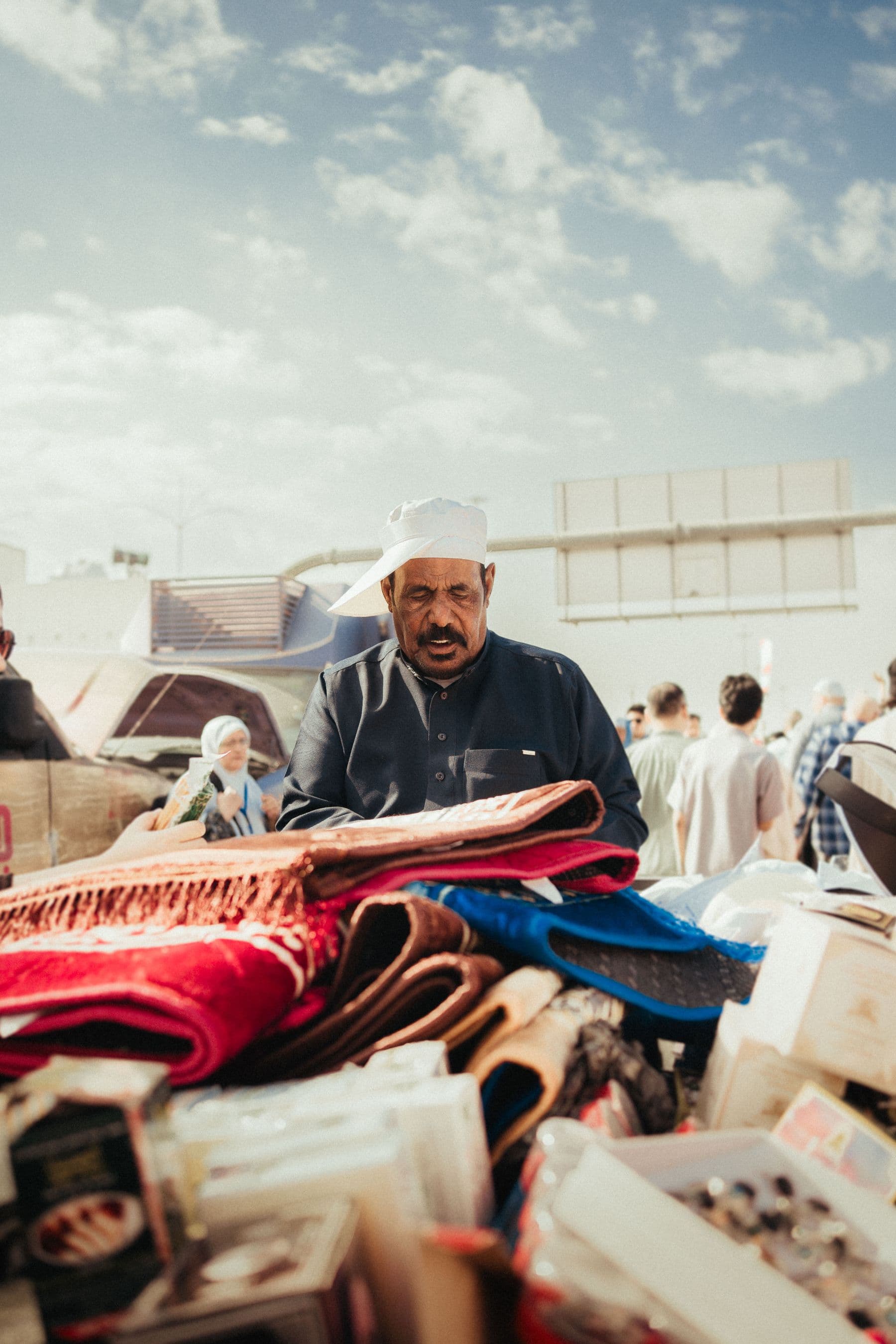 Local vendor serving customers in a busy Middle Eastern market